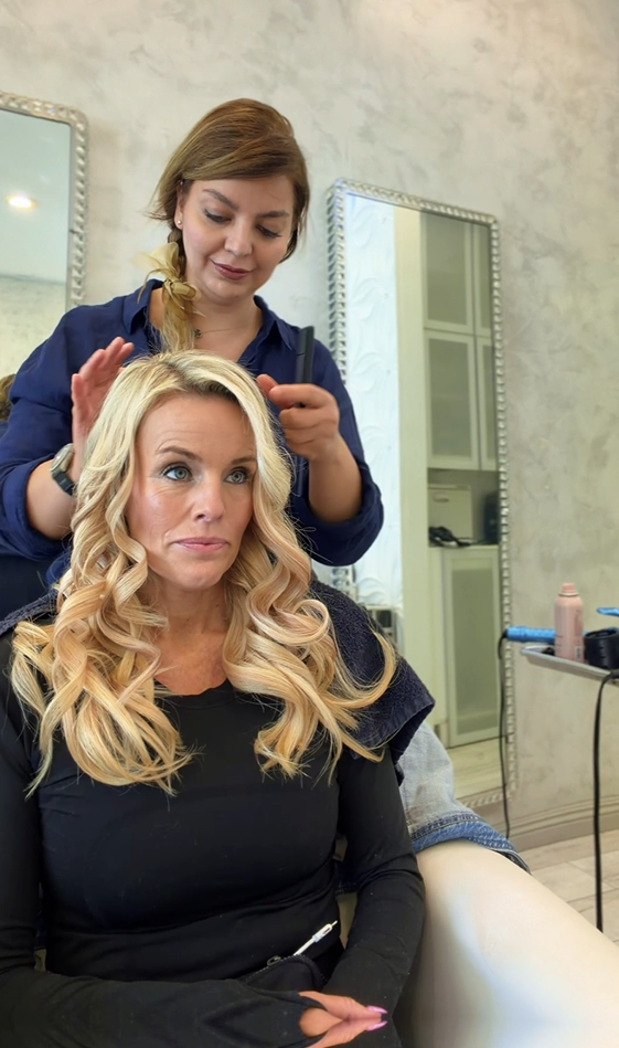 Roza Glam client with soft blonde blowout waves