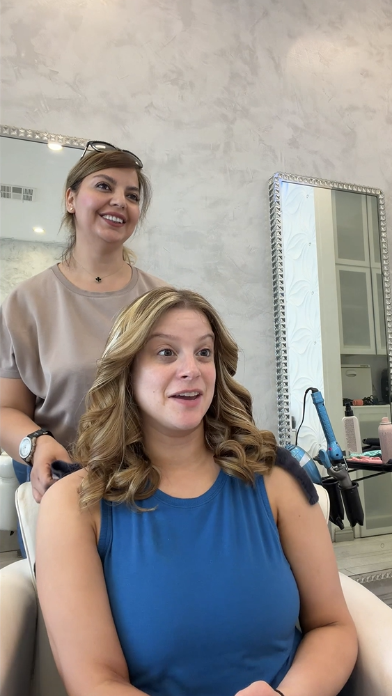 Client with soft curled hair at Roza Glam