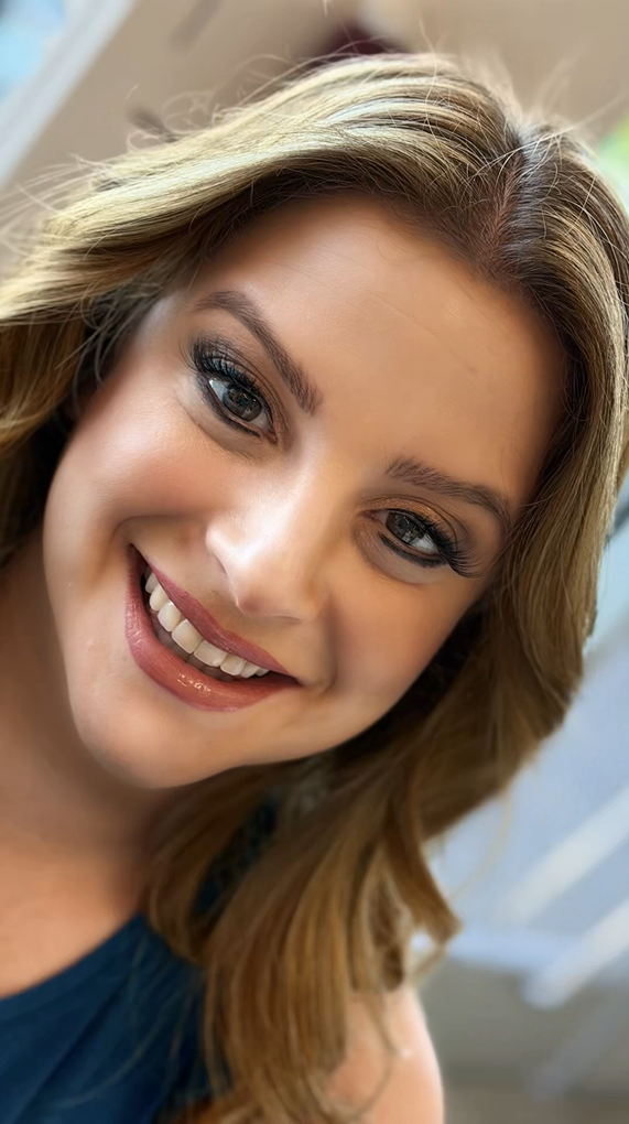 Client with soft glam makeup at Roza Glam